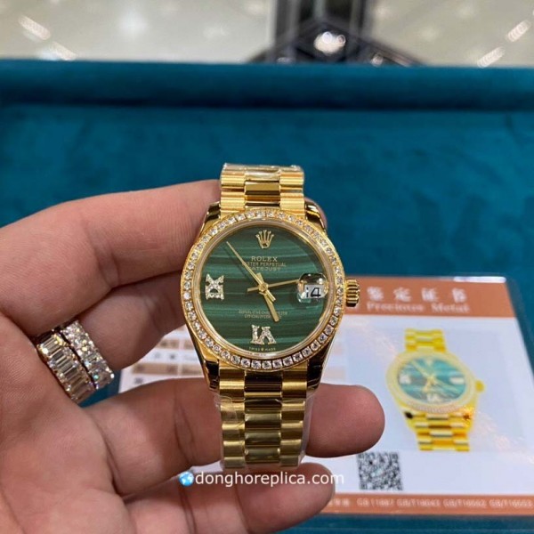 Đồng hồ Rolex dây vàng mặt xanh