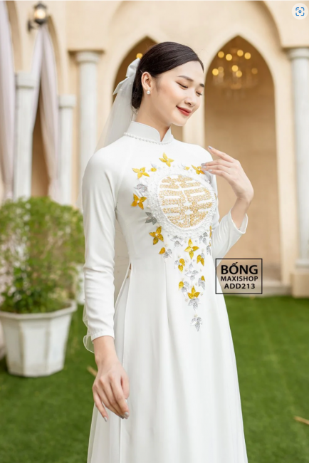 Học hỏi những mẫu áo dài cưới đẹp nhất 2022 của NTK Đinh Văn Thơ