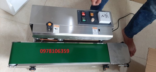 Máy hàn miệng túi bao kem, máy ép miệng bao bánh kẹo, máy hàn túi liên tục Fr900